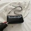 Design de nicho francês versão coreana versátil bolsa baguette padrão crocodilo bolsa de ombro retrô 2026 nova bolsa de mão bolsa de ombro