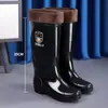 Botas de lluvia impermeables de caña alta para hombre, de color liso, suela gruesa, duraderas, ligeras, cálidas, de altura media y antideslizantes.