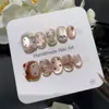 Gatito Blanco y Marrón con SombreroLazo de estampado de leopardo a cuadros pintado a manoojos de gato brillantesartesanía para uñas de gatito lindo