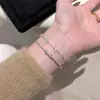 Pulseira Meia Lua com Laço Estilo Xiaohongshu Pulseira de Corrente Moda de Alto Padrão Luxo Acessível Ouro Champanhe Joia de Mão Exquisita