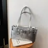 Bolso de axila de alta calidad estilo francés con un diseño moderno y único, un bolso de hombro y bolso de mano versátil para mujer