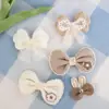 Café con Leche Otoñal Orejas de Conejo Malla Cisne Lazo Decorativo DIY Ropa Infantil Accesorios para Pantimedias Accesorios de Yiwu