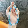 Cadena de llavero de cuentas de colores con luz UV creativa para teléfono móvil, colgante lindo para bolso, accesorios para funda de teléfono móvil, venta al por mayor