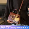Bolso de mujer personalizado, bolso de hombro versátil para mujer con estampado de piedra, nuevo bolso de mano de moda de invierno, bolso Kelly retro a la moda