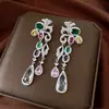 Brincos de Argola Cruzados com Zircônia Pedra Prateada Oval Gota D'água Borla Simples Moda Versátil Leve Luxo Nicho para Mulheres