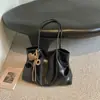 Bolsa de mano retro de gran capacidad Shuai Mijia para mujer, nuevo modelo 2026, bolso de hombro casual elegante y moderno estilo coreano