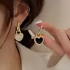 Pendientes de latón encantadores de doble cara en blanco y negro estilo retro francés estilo coreano pendientes de moda para el día a día pendientes exquisitos para mujer