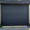 Puerta de garaje de villa europea nueva de los fabricantes, puerta de aleta de aleación de aluminio, puerta enrollable, control remoto inteligente, puerta levadiza resistente al viento