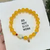 Pulsera de ágata amarilla estilo Pangdonglai, pulsera de hebilla de paz de ágata amarillo natural, pulsera de cuentas budistas para mujer con cuentas redondas al por mayor