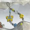 Venta al por mayor del fabricante Nuevo modelo Gato Kt Lazo Cadena para teléfono Colgante de cadena para teléfono con cuentas hecho a mano Decoración para niñas