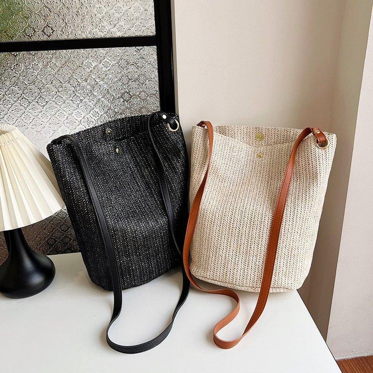 编织包女包新款潮2024夏草编简约百搭小清新水桶包个性单肩斜
