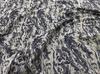 Marmolado de olas moda vanguardista jacquard tela para ropa bolsa de cosméticos simple textura tela teñida en hilo decorativa