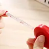 Cinta métrica retráctil automática al por mayor 1.5m Cinta métrica para ropa Estudiante Color caramelo Portátil Redonda Regla de plástico