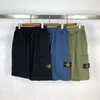 Braçadeira de Bússola de Pedra Transfronteiriça Marca Tendência Europeia e Americana Bolso Grande Cor Sólida Casual Solta Calça de Cinco Pontas para Homens e Mulheres