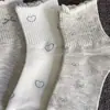 Novo estilo popular: meias cinza mescla com laço, meias femininas de cano médio para primavera e outono, design simples de renda outono/inverno, estilo coreano, modernas e populares entre estudantes