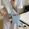 Moda de Nicho Bolso de Cubo Simple de Mano Bolso Cruzado para Mujer 2026 Primavera Nuevo Estilo Bolso de Hombro Casual para el Trabajo