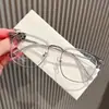 Nuevos lentes para hombre estilo retro, modernos y elegantes, diseñados para hombres conocedores de la tecnología, con lentes transparentes, bloqueo de luz azul y un refinado diseño de media montura