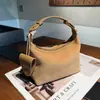 Bolso vintage de cuero genuino transfronterizo para mujer, bolso tipo dumpling de ante esmerilado de capa superior de piel de vaca, bolso de mano y bandolera versátil para el uso diario de las mujeres