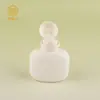Botella Vacía Portátil de Material PE con Cuerpo de Presión para Loción Corporal Cosméticos al por Mayor Plana Redonda Gordita Tapa de Presión abatible Botella de Loción