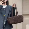 Bolso de piel de vaca de capa superior, bolso de mano coreano de nicho de cuero genuino, bolso de hombro de gran capacidad para el trabajo con un toque de alta gama para mujer