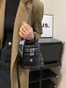 Bolso de mano para mujer transfronterizo, nuevo modelo 2026, nicho retro moda elegante bolso cilíndrico acolchado, bolso de hombro y cruzado, moderno