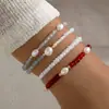Pulsera elástica de múltiples capas para mujer, cruz de moda popular transfronteriza europea y americana, elegante, simple, de imitación de perla ABS, CCB