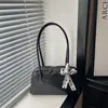 Bolsa de ombro simples retrô estilo coreano, bolsa casual de nicho feminina, nova bolsa de antebraço personalizada primavera 2026
