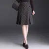 Elegante falda de cuadros para mujer, nuevo modelo otoño 2026, de cintura alta, falda de línea A adelgazante, falda midi moderna y juvenil