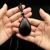 Collar Colgante Piedra Negra Medicinal que Cambia de Color con Transmisión de Luz Buda Guanyin Amuleto que Cambia de Color Collar Pixiu Cadena de Suéter Venta al por Mayor