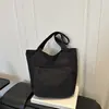 Bolso de mujer simple y versátil 2026, bolso de hombro simple de gran capacidad, bolso de mano para estudiante, bolso cruzado, bolso tote para el trabajo