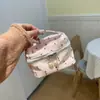 Bolso de mano bordado de nicho nuevo con gran capacidad de almacenamiento, neceser en colores de caramelo, bolso pequeño, neceser