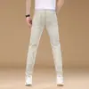 Tendencia de Moda 2026 Otoño Nuevos Jeans Elásticos Ajustados para Hombre Marca Trendy de Gama Alta Lavados Casuales Pantalones Largos