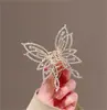 Pinza de Tiburón Mariposa con Borlas y Perlas, Pasador de Alto Nivel Estilo 2026 para la Parte Trasera de la Cabeza, Elegante Pinza para Recogido de Cola de Caballo