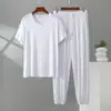 Nuevo conjunto de ropa de casa para hombre, talla grande, corte holgado, top de modal fino de manga corta con cuello en V y pantalones largos con puño, conjunto de dos piezas