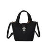 Bolsa de cubo texturizada de alta calidad al por mayor para mujer, nuevo estilo verano 2026, color liso, elegante bolsa de hombro, bolso cruzado para madre e hija