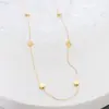 Gargantilla de personalidad europea y americana, diseño de nicho ligero de lujo, cadena plana en forma de S, acero de titanio, oro de 18 quilates, collar de clavícula con pequeño grano de oro