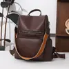 Mochila con textura de cuero suave de PU, gran capacidad, nuevo bolso transfronterizo para mujer, antirrobo, bolsa de viaje simple, mochila escolar casual ligera