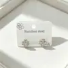 Brincos de Tarraxa de Trevo de Quatro Folhas de Venda Quente Transfronteiriça Nicho High-End Aço Inoxidável Cor Duradoura Coração Totalmente cravejado de Diamante Joia Versátil de Luxo Leve