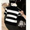 Top de Punto Tencel Rayado Blanco y Negro de Manga Media para Mujer, Ajuste Ceñido con Cuello Medio Alto, Superventas Verano 2026