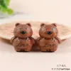 Urso fofo de nariz preto feito de madeira de pêssego, acessório de escultura em madeira DIY, chaveiro artesanal, pingente de bolsa e acessório decorativo