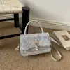 Bolso cuadrado pequeño de lujo ligero estilo coreano transfronterizo para mujer, nuevo bolso de hombro de mariposa invierno 2025, bolso cruzado de alta gama
