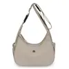 Bolso bandolera mujer 2026 nuevo gran capacidad un solo hombro deportivo versátil bolsa de albóndiga mujer casual para ir al trabajo mochila