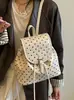 Mochila de lunares de nicho estilo coreano para mujer, nueva moda popular 2026, mochila pequeña versátil de gran capacidad con asa