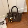 Bolsa Pequena Texturizada da Moda para Mulheres 2026 Chegada de Outono Design de Nicho Bolsa Transversal Estilo Coreano Bolsa de Balde Dobrada de Mão