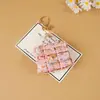 Estilo pequeño francés transfronterizo moda creativa mini bolso llavero colgante amuleto de bolso monedero funda para auriculares al por mayor mujer