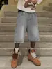 Shorts de mezclilla estilo retro americano lavado de alta calle para hombre y mujer, rectos de pierna ancha, desgastados, holgados, casuales, versátiles, pantalones cortos