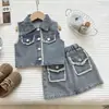 Conjunto de mezclilla de verano para niñas de dropshipping transfronterizo: Conjunto de dos piezas para niña: top tipo chaleco con cuello y minifalda sin mangas