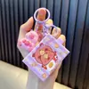 Llavero de Máquina de Ardilla de Pizza Máquina de Peluches Juguete de Regalo Pequeño Colgante para Mochila Escolar de Estudiante Llavero de Llave de Coche