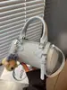 Bolso pequeño súper moderno y exquisito para mujer, nueva colección 2026, con un toque de alta gama, perfecto para el verano y el uso diario, un elegante bolso de hombro o bandolera.