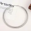 Anel Retro Europeu e Americano Mola Vazada Colar Personalizado Colar de Metal Simples Colar Avançado Transfronteiriço Atacado